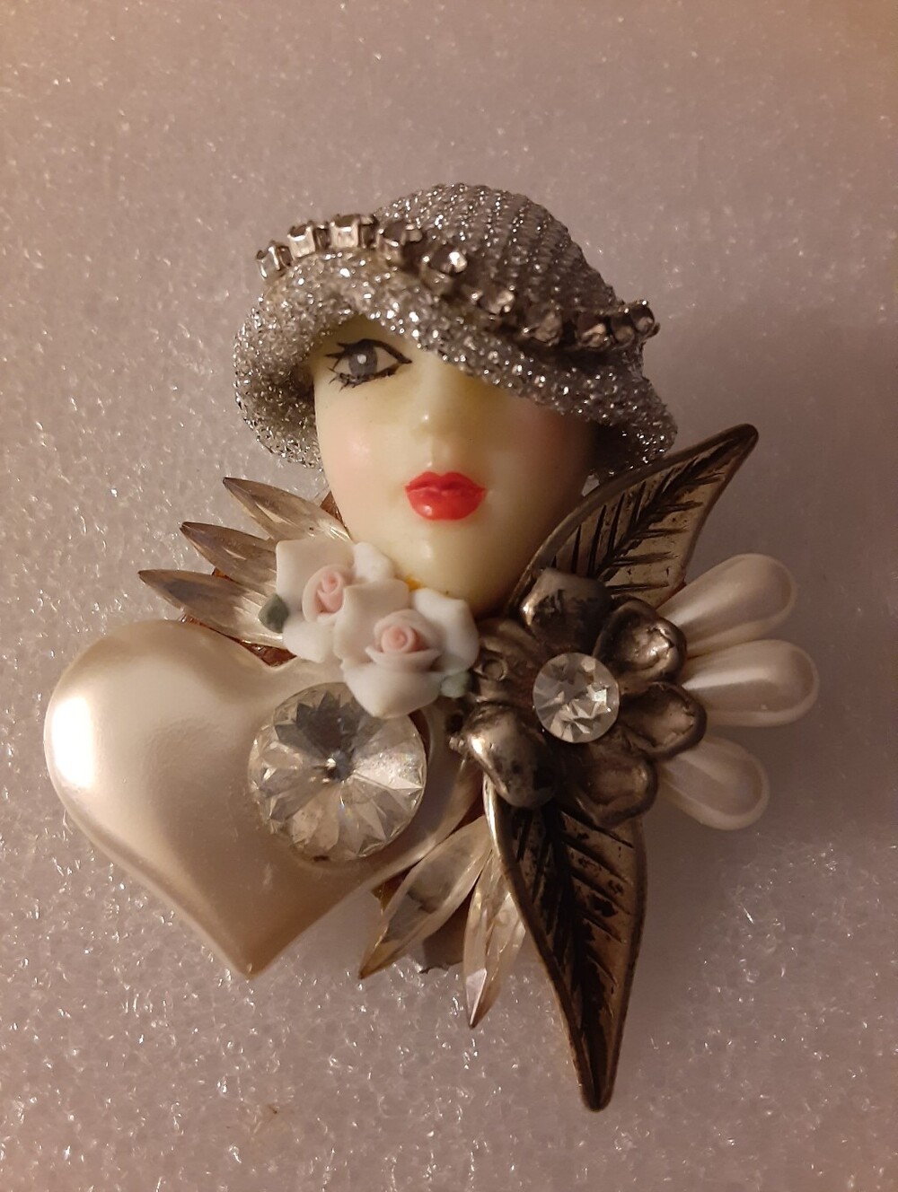 Vintage-style Silver and Pearl Woman Face Brooch with Crystal Accents